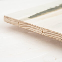 Seitenansicht eines Fotodrucks auf Holzlatten mit sichtbaren Kanten.